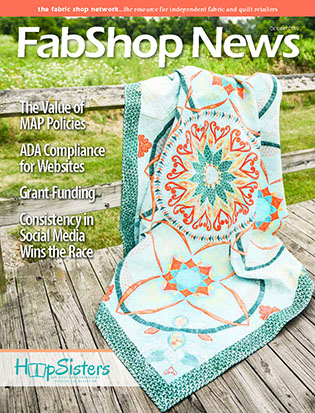 HoopSisters Quilt on the Cover of Fabshop News Magazine